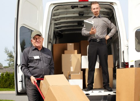 Packed office boxes and labelled items ready for a move