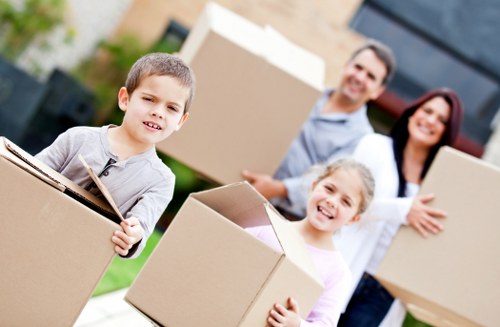 Packed boxes and wrapped furniture ready for removal in North London