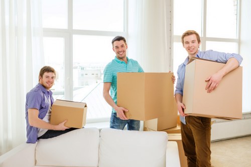 Careful furniture loading during a home move in North London