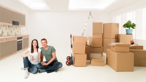 Professional movers loading household items for a Pentonville relocation