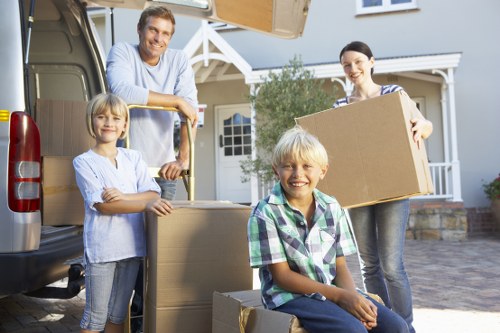 Man with van team preparing for delivery under UK terms