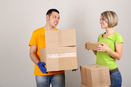 Team securing items inside a moving van safely