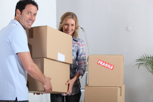 Professional loading of household items into a moving van