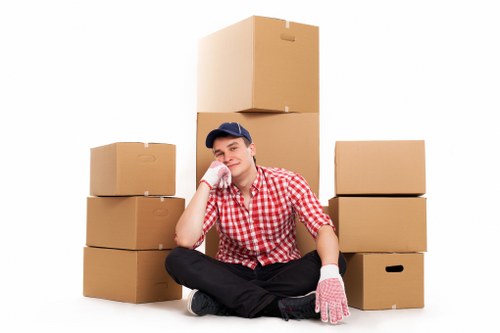 Professional removal team handling stairs and furniture in Pentonville