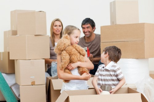 Packed moving boxes and furniture ready for removal services in Pentonville